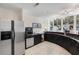 Well-equipped kitchenette with stainless steel appliances and ample cabinet space at 384 Ralph Mcgill Ne Blvd # 123, Atlanta, GA 30312