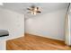 Bright, open living room featuring gleaming hardwood floors and a ceiling fan at 384 Ralph Mcgill Ne Blvd # 123, Atlanta, GA 30312