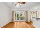 Inviting living room with gleaming hardwood floors and patio access with garden view at 384 Ralph Mcgill Ne Blvd # 123, Atlanta, GA 30312