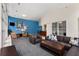 Comfortable lounge featuring blue accent wall, contemporary furniture, and elegant decor at 384 Ralph Mcgill Ne Blvd # 123, Atlanta, GA 30312