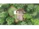 Aerial view of the backyard showcasing mature trees, deck, and outdoor living space at 3852 Vinyard Ne Ct, Marietta, GA 30062