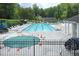 Large community pool with lounge chairs, perfect for relaxation and recreation at 3852 Vinyard Ne Ct, Marietta, GA 30062