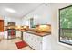 Bright kitchen featuring stainless steel appliances, backsplash, and white cabinets at 3852 Vinyard Ne Ct, Marietta, GA 30062