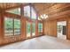 Spacious living room with vaulted wood ceiling, plenty of natural light and access to the back deck at 3852 Vinyard Ne Ct, Marietta, GA 30062