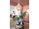 Modern dining decor featuring unique pendant lighting and centerpiece at 720 Maynard Se Ter, Atlanta, GA 30316
