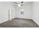 Large bedroom with carpet, a window, and a ceiling fan at 1365 Athens Sw Ave, Atlanta, GA 30310