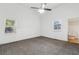 Cozy bedroom with carpet, ceiling fan, and a view to an en-suite bathroom at 1365 Athens Sw Ave, Atlanta, GA 30310