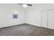 Bedroom with a window, carpet, and double-door closet for storage at 1365 Athens Sw Ave, Atlanta, GA 30310