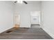 Cozy carpeted bedroom featuring a ceiling fan and bright white walls at 1365 Athens Sw Ave, Atlanta, GA 30310