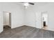 Bright bedroom with doorways to bathroom and hallway, carpet floors at 1365 Athens Sw Ave, Atlanta, GA 30310