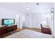 Relaxing bedroom with a spacious closet and a dedicated workspace at 306 Autumn Leaf Way, Norcross, GA 30093
