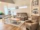 The comfortable living room offers cozy seating, a fireplace, and stylish decor at 3473 Newtons Crest Cir, Snellville, GA 30078
