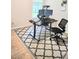 Functional home office with modern desk setup and stylish area rug at 3473 Newtons Crest Cir, Snellville, GA 30078