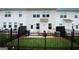 View of the fenced backyard and outdoor seating area at 3579 Silvery Way, Powder Springs, GA 30127