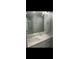 Bathroom featuring a double vanity with white countertops, a large mirror and a glass shower at 3579 Silvery Way, Powder Springs, GA 30127