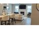 Bright living room with a fireplace, hardwood floors, and modern furniture at 3579 Silvery Way, Powder Springs, GA 30127