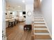 Welcoming foyer leads to an open-concept living space with modern finishes and a cozy seating area at 3579 Silvery Way, Powder Springs, GA 30127