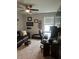 Dedicated office space with desk, chair, couch, and natural light at 3579 Silvery Way, Powder Springs, GA 30127
