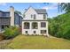 Two-story home showcases a well-maintained lawn and inviting outdoor living spaces at 1433 Wessyngton Ne Rd, Atlanta, GA 30306