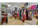 Spacious walk-in closet with ample storage, mirrored doors, and a variety of personal items at 1433 Wessyngton Ne Rd, Atlanta, GA 30306