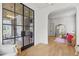 Foyer with glass and steel door and view to living room at 1433 Wessyngton Ne Rd, Atlanta, GA 30306