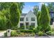 Beautiful two-story home with a well-manicured front yard and charming curb appeal at 1433 Wessyngton Ne Rd, Atlanta, GA 30306
