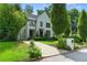View of the attractive exterior showcasing its driveway and meticulous landscaping at 1433 Wessyngton Ne Rd, Atlanta, GA 30306