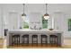 Bright kitchen with large island, marble counters and hardwood floors at 1433 Wessyngton Ne Rd, Atlanta, GA 30306
