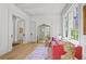 Living room with archways, wood floors, and large windows at 1433 Wessyngton Ne Rd, Atlanta, GA 30306