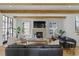 Bright living room features wooden beams, fireplace, and comfortable seating at 1433 Wessyngton Ne Rd, Atlanta, GA 30306