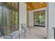 Cozy porch with brick flooring and comfortable seating area at 1433 Wessyngton Ne Rd, Atlanta, GA 30306