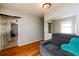 Bedroom with hardwood floors and sitting area at 1472 High Meadow Dr, Stone Mountain, GA 30083