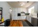 Functional kitchen featuring white cabinets, subway tile backsplash, and stainless steel appliances at 1472 High Meadow Dr, Stone Mountain, GA 30083