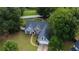Aerial view showcasing this well-situated property, surrounded by lush trees and greenery at 556 Walton Dr, Social Circle, GA 30025
