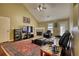 Inviting living room featuring a cozy fireplace, wood floors, and vaulted ceilings at 556 Walton Dr, Social Circle, GA 30025