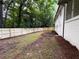 Backyard with a newly installed wooden fence, and landscaping at 1703 Barrett Nw Dr, Atlanta, GA 30318