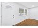 Bright entryway with hardwood floors, white trim, and plenty of natural light at 1703 Barrett Nw Dr, Atlanta, GA 30318