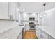 Modern kitchen with stainless steel appliances, granite countertops, and subway tile backsplash at 1703 Barrett Nw Dr, Atlanta, GA 30318