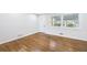 Inviting living area with hardwood floors and lots of natural light at 1703 Barrett Nw Dr, Atlanta, GA 30318