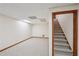 Carpeted basement leading to a staircase on the right at 2110 Waterloo Cir, Lawrenceville, GA 30043