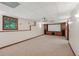 Finished basement perfect for a home theater, featuring a screen, projector, and large window at 2110 Waterloo Cir, Lawrenceville, GA 30043