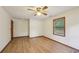 Well-lit bedroom featuring a window and neutral tones throughout at 2110 Waterloo Cir, Lawrenceville, GA 30043