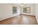 Comfortable bedroom with natural light from two large windows at 2110 Waterloo Cir, Lawrenceville, GA 30043