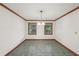 The formal dining room is painted in neutral colors with tile flooring and trim at 2110 Waterloo Cir, Lawrenceville, GA 30043