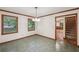 Dining room features tile floor, natural trim, and ample sunlight at 2110 Waterloo Cir, Lawrenceville, GA 30043
