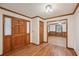 Welcoming entryway showcasing hardwood floors and natural wood trim and doors at 2110 Waterloo Cir, Lawrenceville, GA 30043
