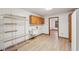 Laundry room featuring a utility sink, shelving, and convenient access at 2110 Waterloo Cir, Lawrenceville, GA 30043