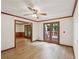 Charming living room featuring hardwood floors and natural light through patio doors at 2110 Waterloo Cir, Lawrenceville, GA 30043