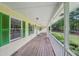 Inviting covered porch with white railings and space for outdoor seating at 2110 Waterloo Cir, Lawrenceville, GA 30043