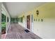 Charming covered front porch with a welcome mat and space for relaxing at 2110 Waterloo Cir, Lawrenceville, GA 30043